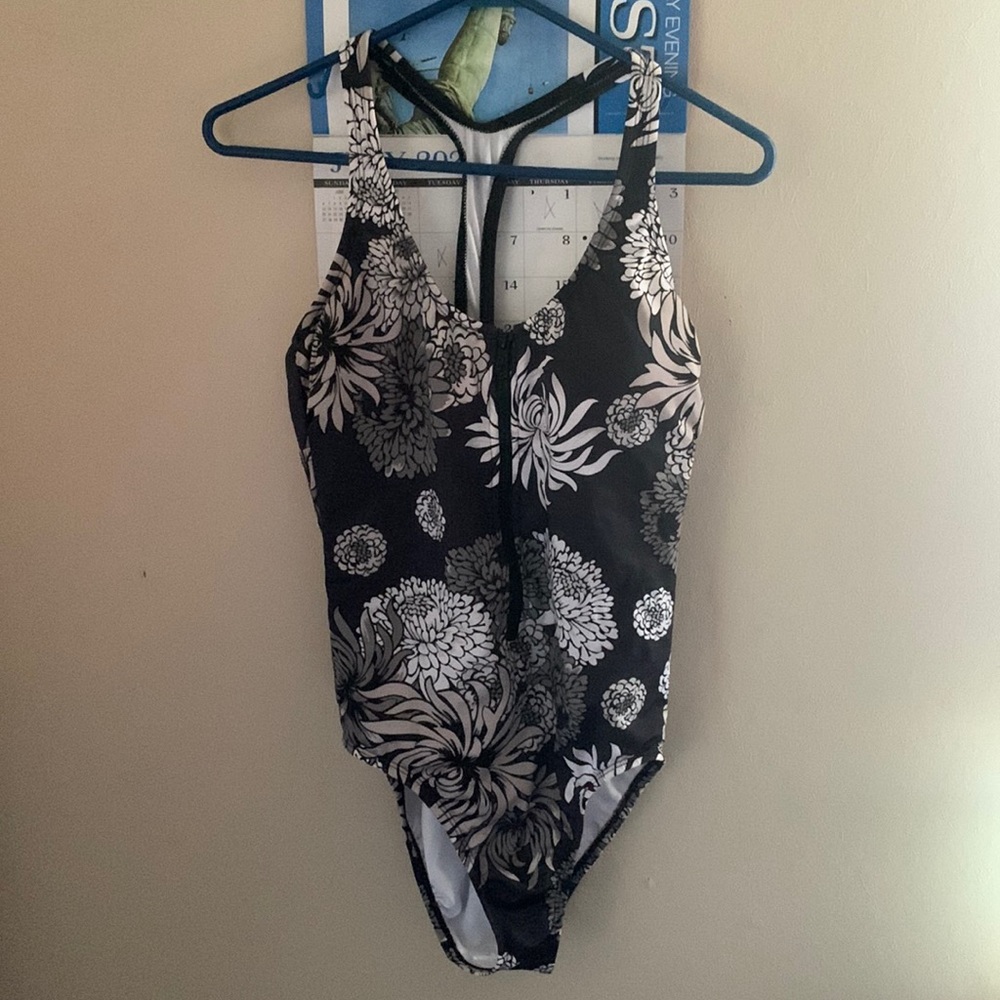 Bathing suit size: medium colors: white, grey,black